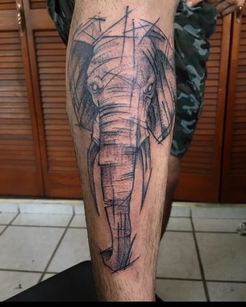 tatuajes de elefantes en la pierna tipo trash polka