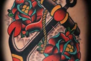 tatuajes de anclas con flores tradicional americano