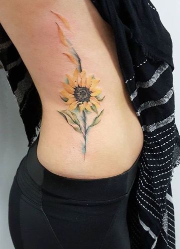 La metafora de 4 tatuajes de girasoles en la muñeca