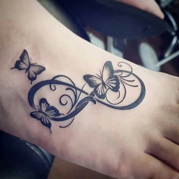 tatuajes de infinito con mariposas definidos