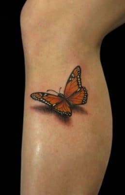 tatuajes de mariposas en 3d en la pierna