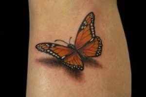 tatuajes de mariposas en 3d en la pierna