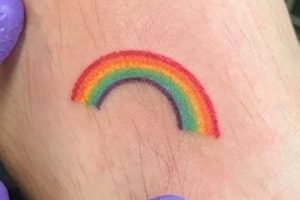 tatuajes de arcoiris en el brazo pequeño