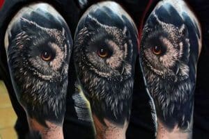 tatuajes de buhos en el brazo realistas
