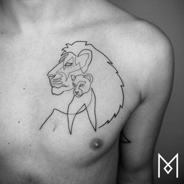 tatuajes de leones en el pecho linea continua