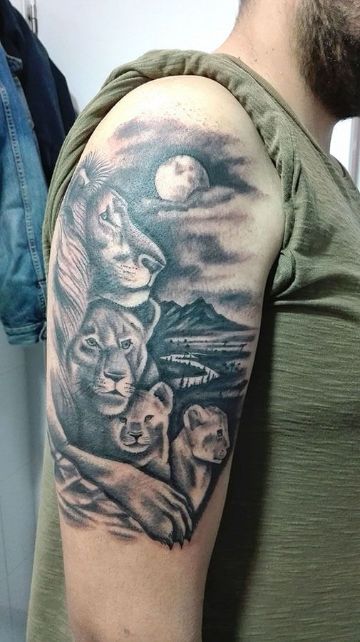 tatuaje leon y cachorro la familia