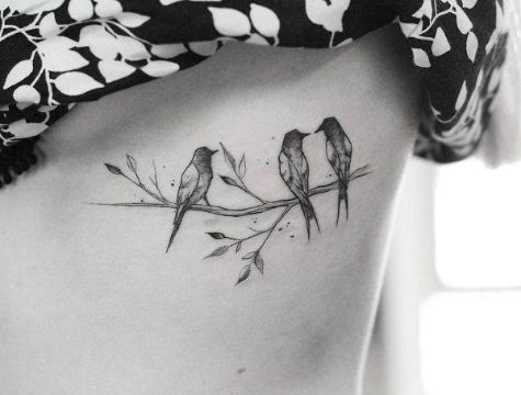 tatuajes de pajaritos en ramas bonitas texturas