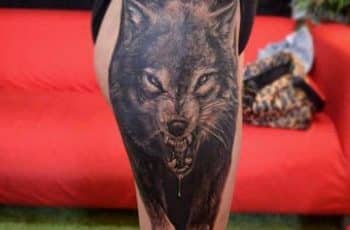 3 tatuajes de lobos en la pierna de lienzos femeninos