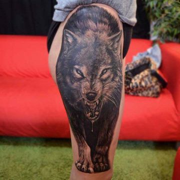 tatuajes de lobos en la pierna realista