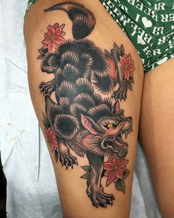 tatuajes de lobos en la pierna tradicional americano