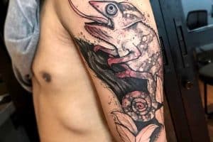 tatuajes de camaleones para hombre en brazo
