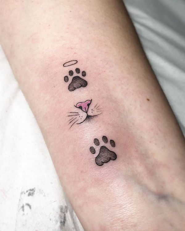 tatuajes de patitas de gato delicados
