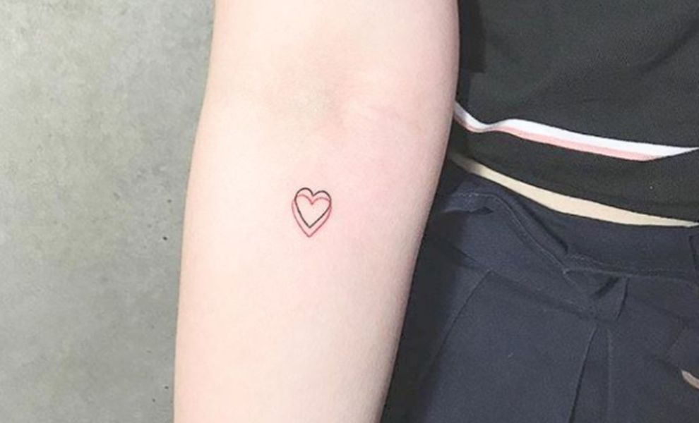 tatuajes de piscis para mujer referencia dos corazones