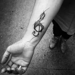 Unicos tatuajes de notas musicales para hombres en 3 zonas