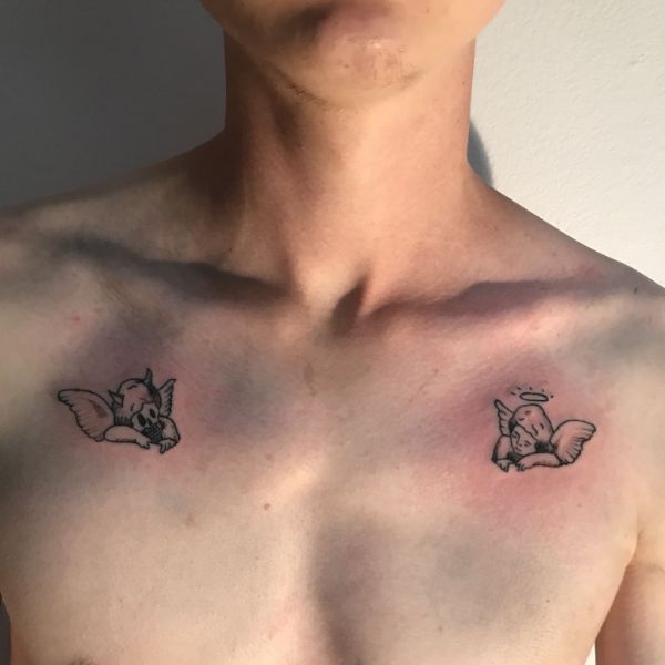 tatuajes de 2 angelitos bebes el bien y el mal