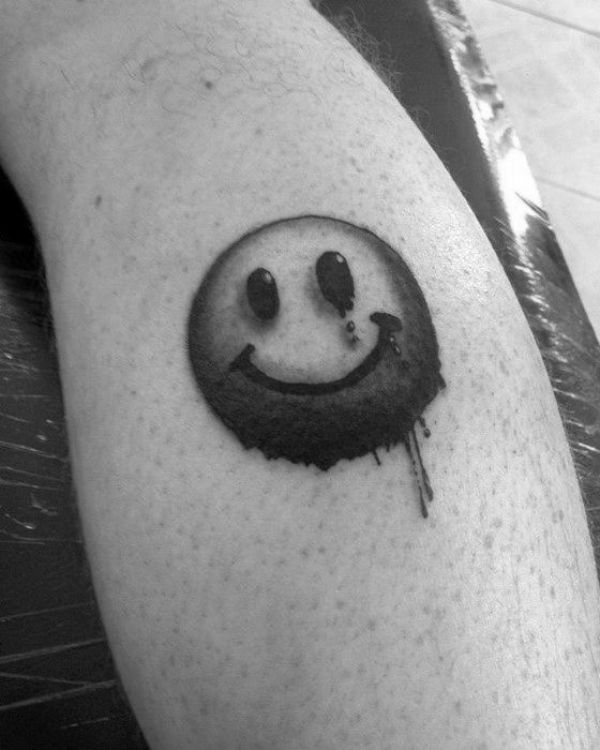 tatuaje carita feliz y triste concepto metaforico