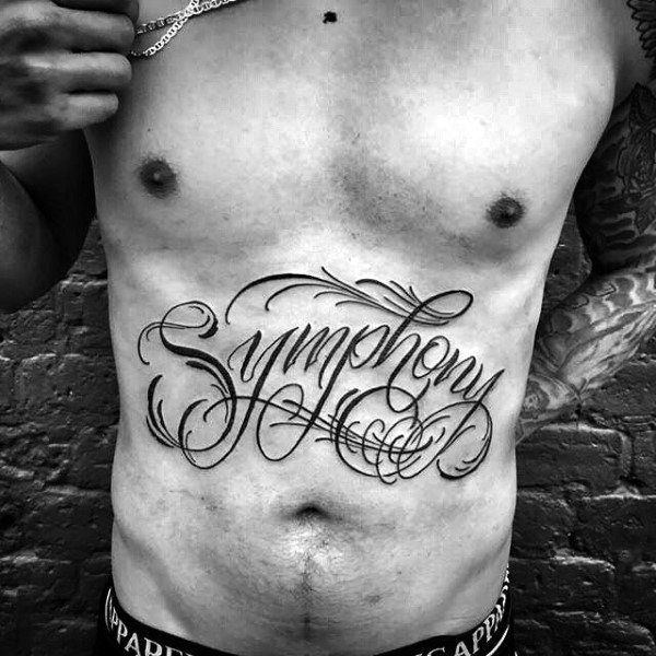 tattoo en la panza hombre tipografia