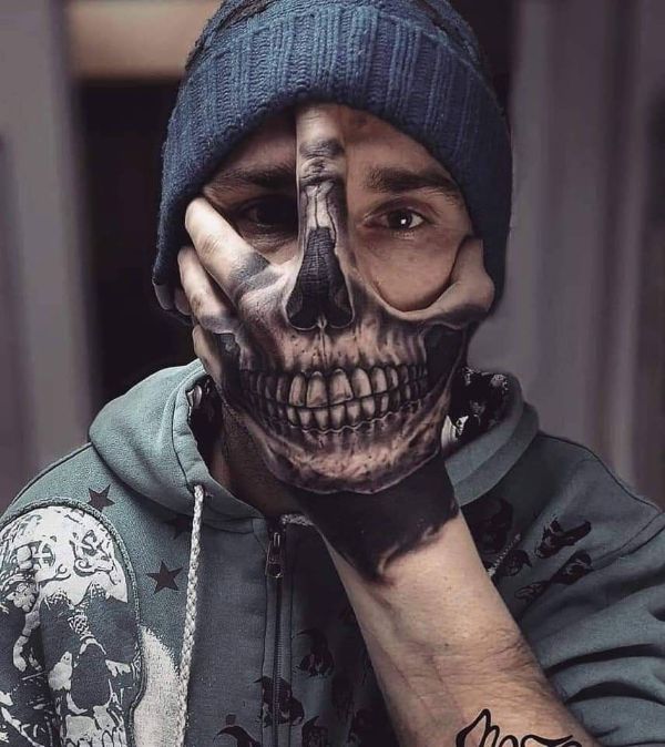 tatuajes de sonrisas macabras esqueleto