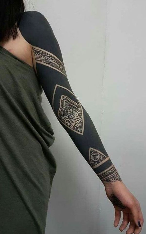 tattoo black out geometrico mandalas y flores