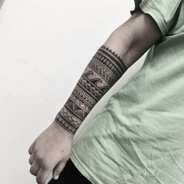 tatuajes de tribales en el brazo media manga